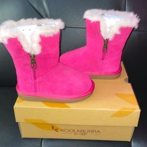 New Little girl Ugg . Little kids size 8 Pink colored Ugg Boots. Beautiful.